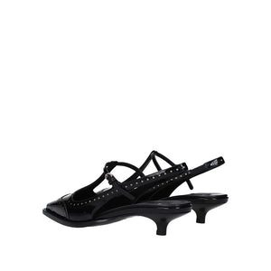Schwarze Pumps aus Kalbsleder mit mittlerem Absatz
