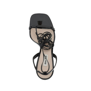Schwarze Sandalen aus Kalbsleder mit Riemen