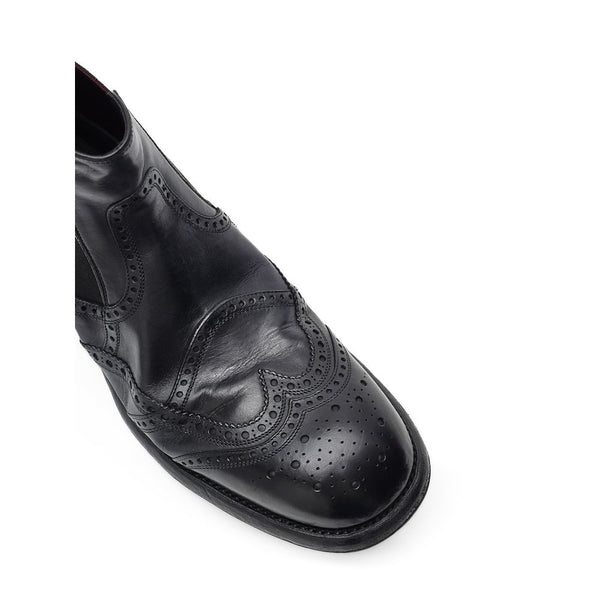 Schwarze Leder-Chelsea-Boots