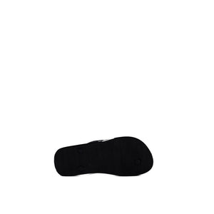 Flip-Flops aus Gummi in Schwarz und Weiß