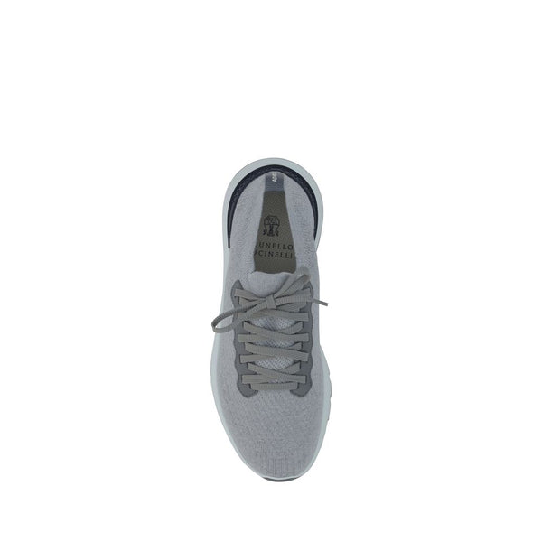 Graue Gummisneaker im Low-Top-Stil
